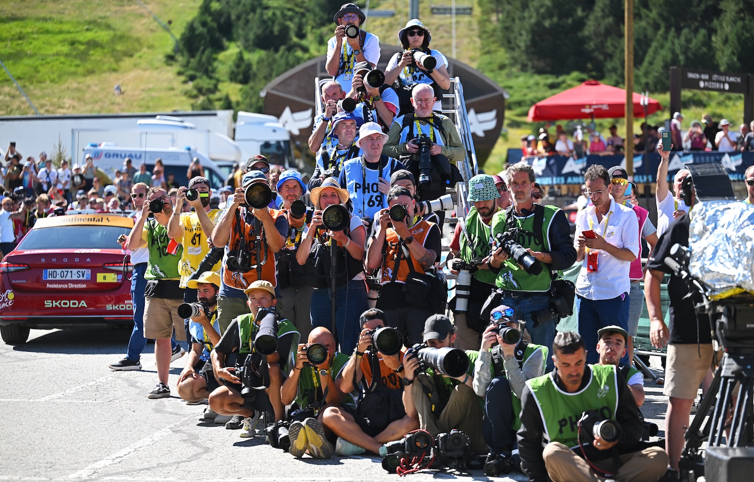 A Chaotic Day In The Life Of The Photographers At The Tour de France
