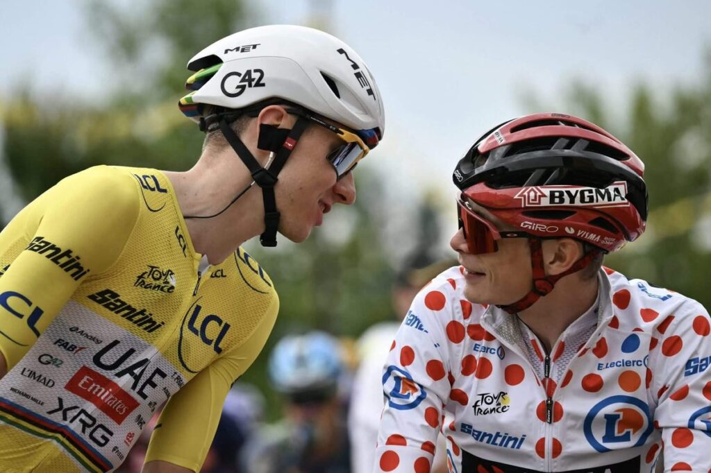 Pogacar speaking to Vingegaard before the start of stage 15 of the Tour de France