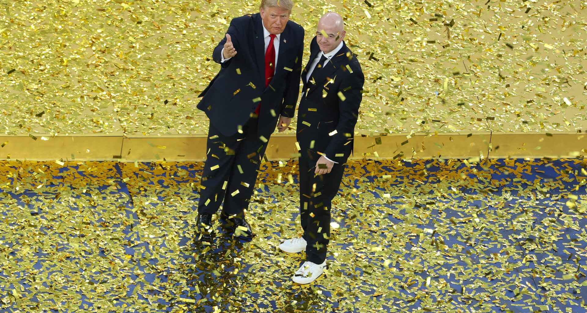 U.S. President Donald Trump and FIFA President Gianni Infantino look on after presenting the FIFA World Cup Winner's Trophy to Spain during the FIFA World Cup 2026 Final match between Spain and Argentina at New York New Jersey Stadium on July 19, 2026 in East Rutherford, New Jersey.