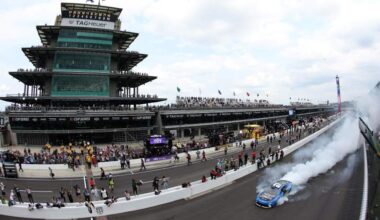 Corey Heim celebrates with a burnout after winning the Brickyard 400 at Indianapolis Motor Speedway.