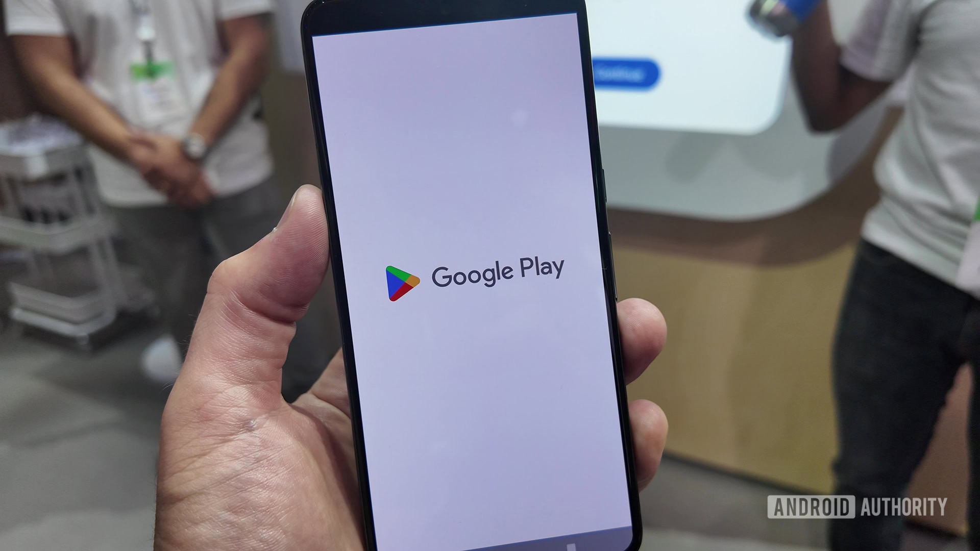 Google Play Logo on Smartphone with White Background Google Play Logo on Smartphone with White Background