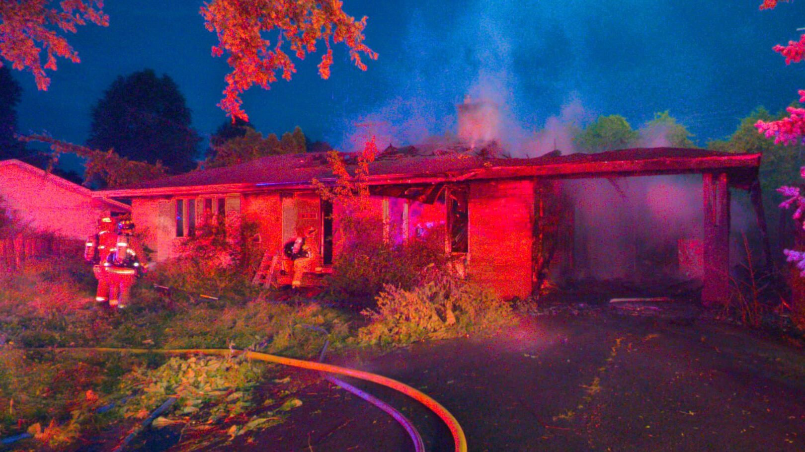 Part of home collapses as firefighters tackle blaze