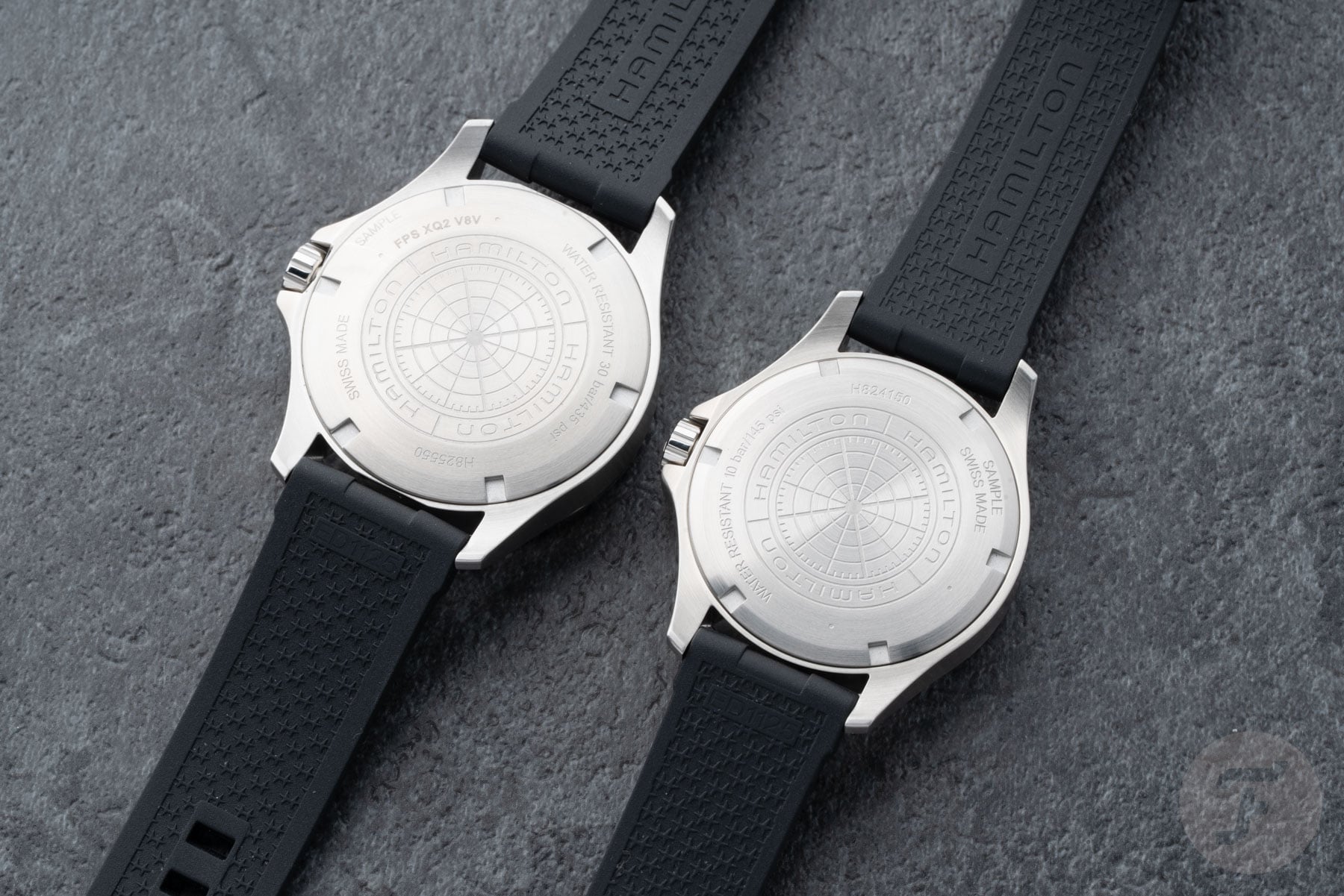 Hamilton Khaki Navy Scuba Auto GMT and three-hander side by side, face down