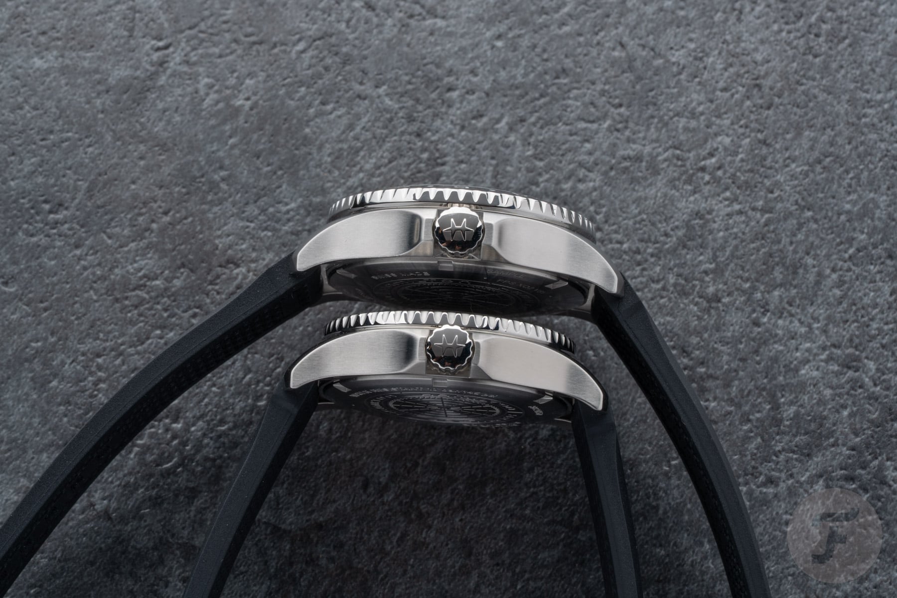 Hamilton Khaki Navy Scuba GMT (top) and Khaki Navy Scuba Auto (bottom), profile view, crown side