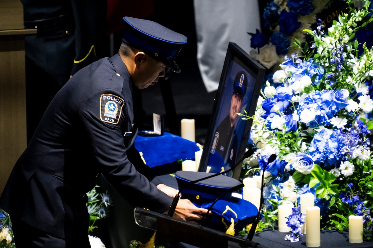 Thousands honour Montreal officer killed in the line of duty