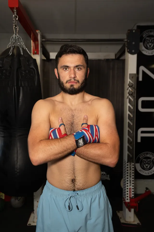 James Dean Fury poses for pictures in the gym