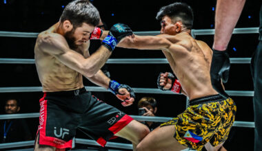 Joshua Pacio punches Mansur Malachiev in their first MMA fight