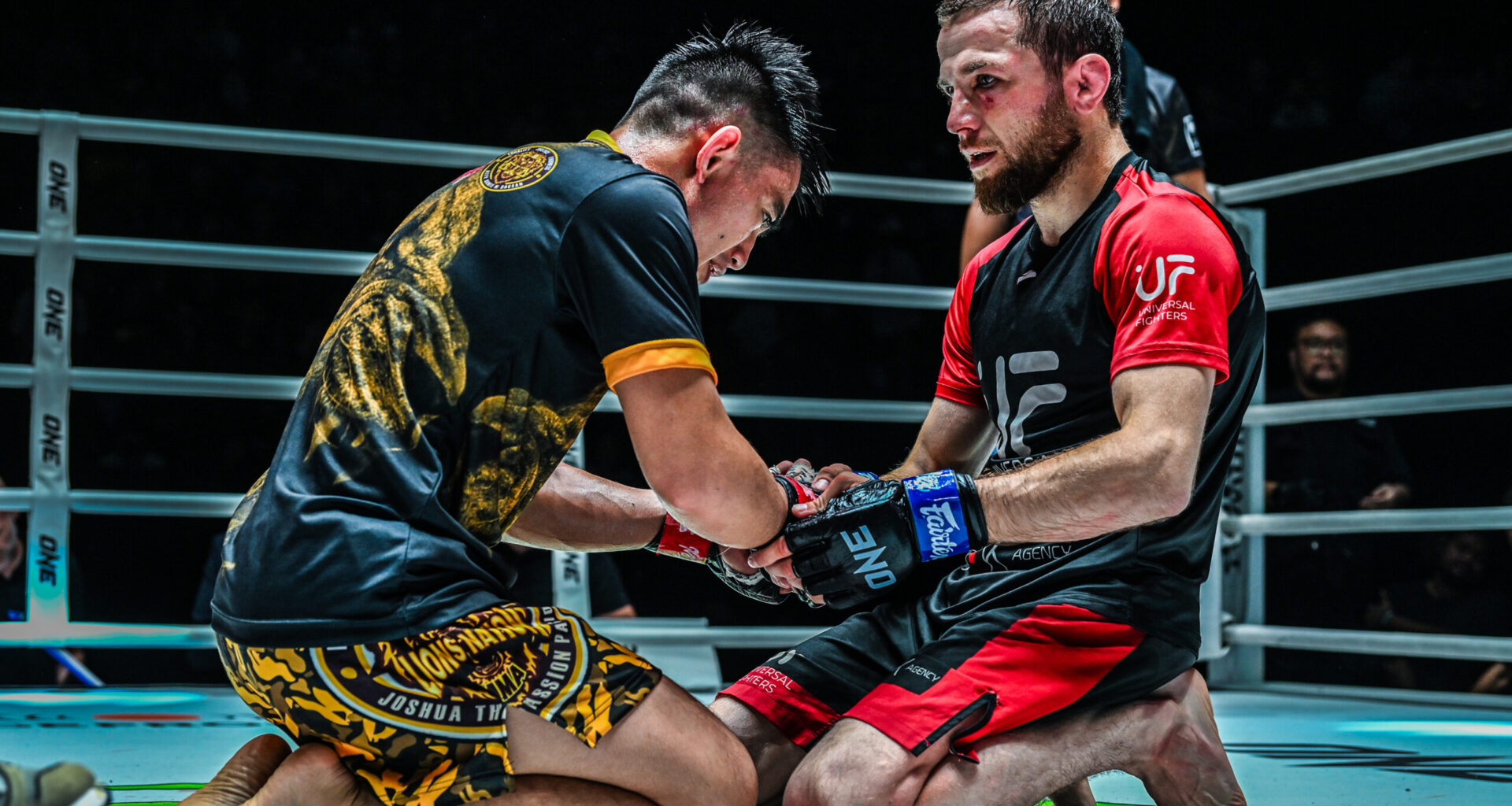 Joshua Pacio and Mansur Malachiev share a moment after their ONE Fight Night 15 battle.