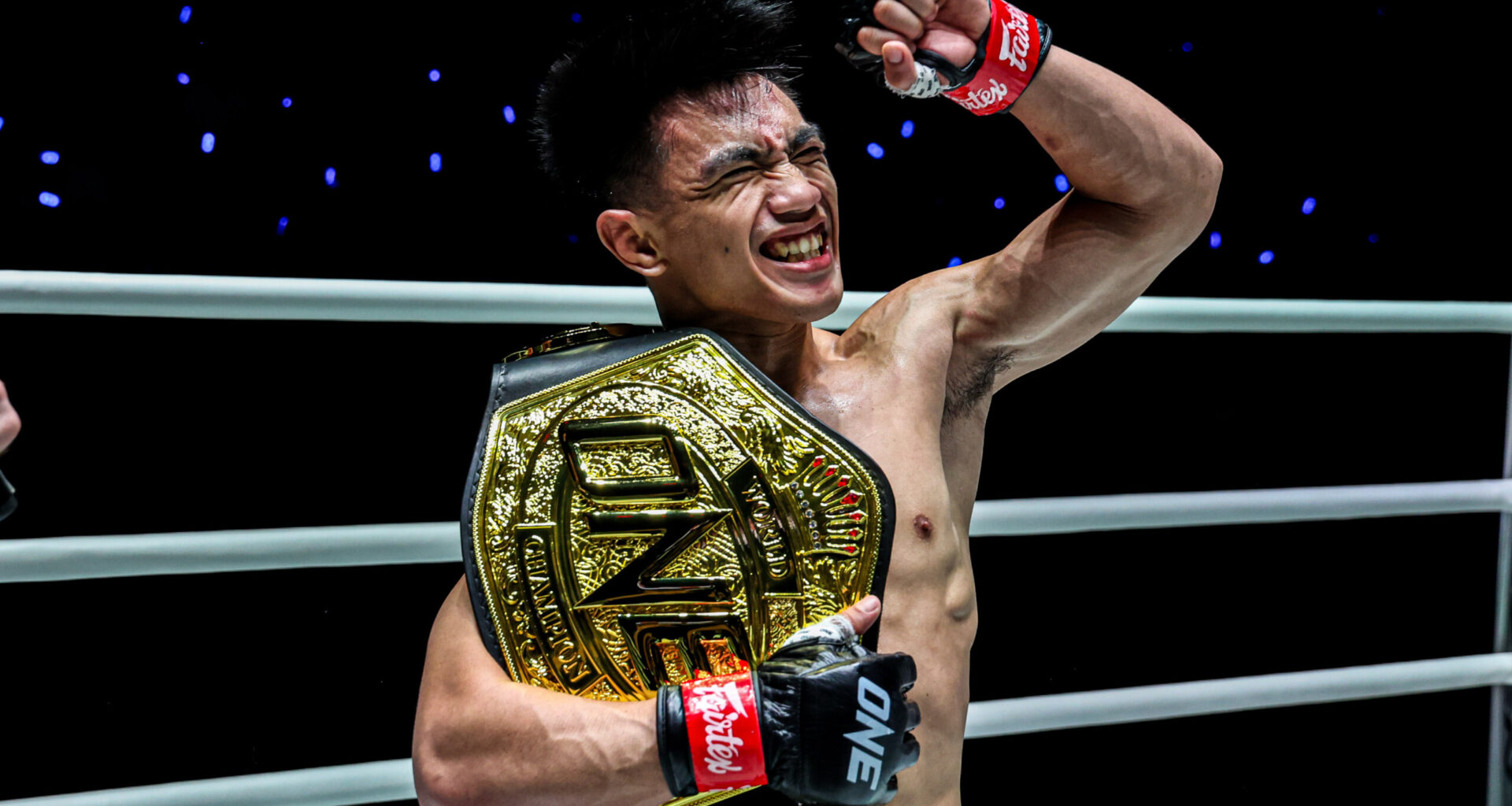 Joshua Pacio celebrates his ONE World Title victory over Mansur Malachiev at The Inner Circle 21