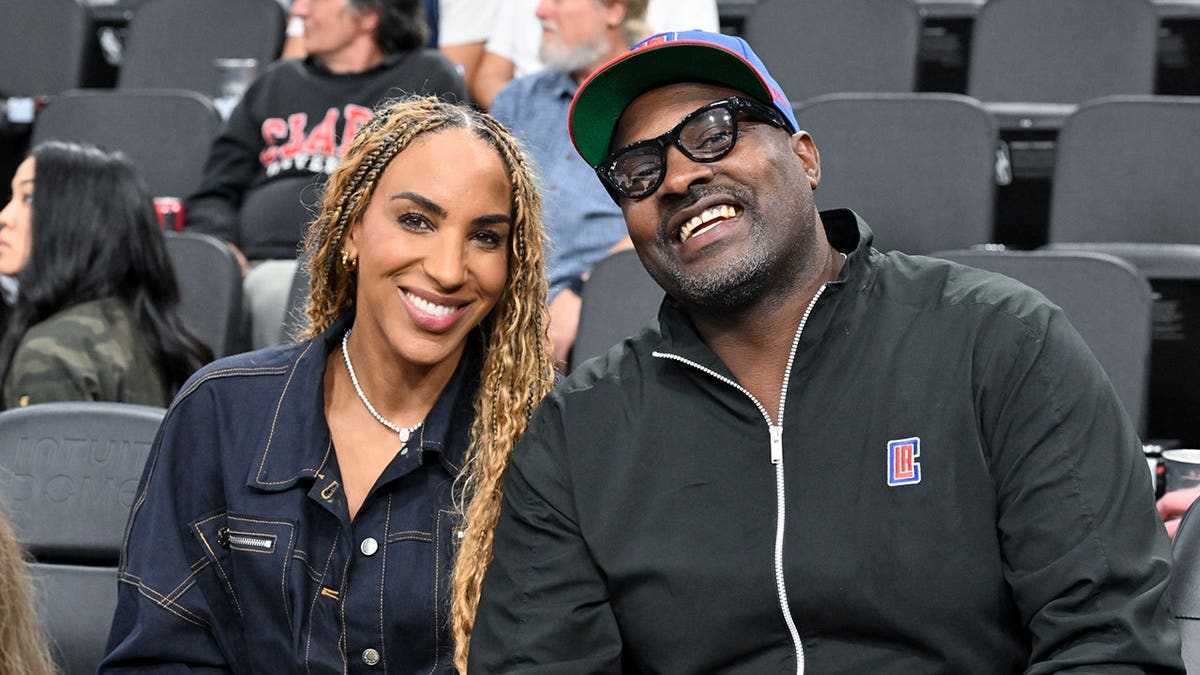 Marcellus Wiley and wife, Annemarie, smile for picture