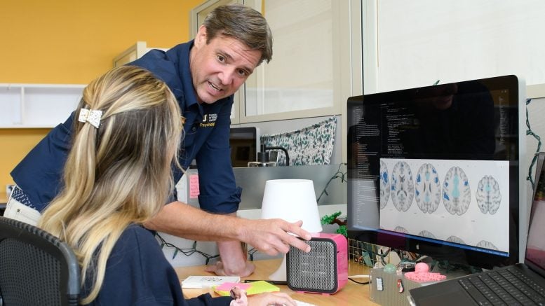 Matthew T. Sutherland Examining Brain Changes