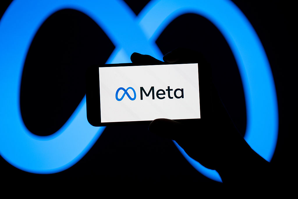 The Meta Platforms, Inc. logo is seen on a smartphone screen.