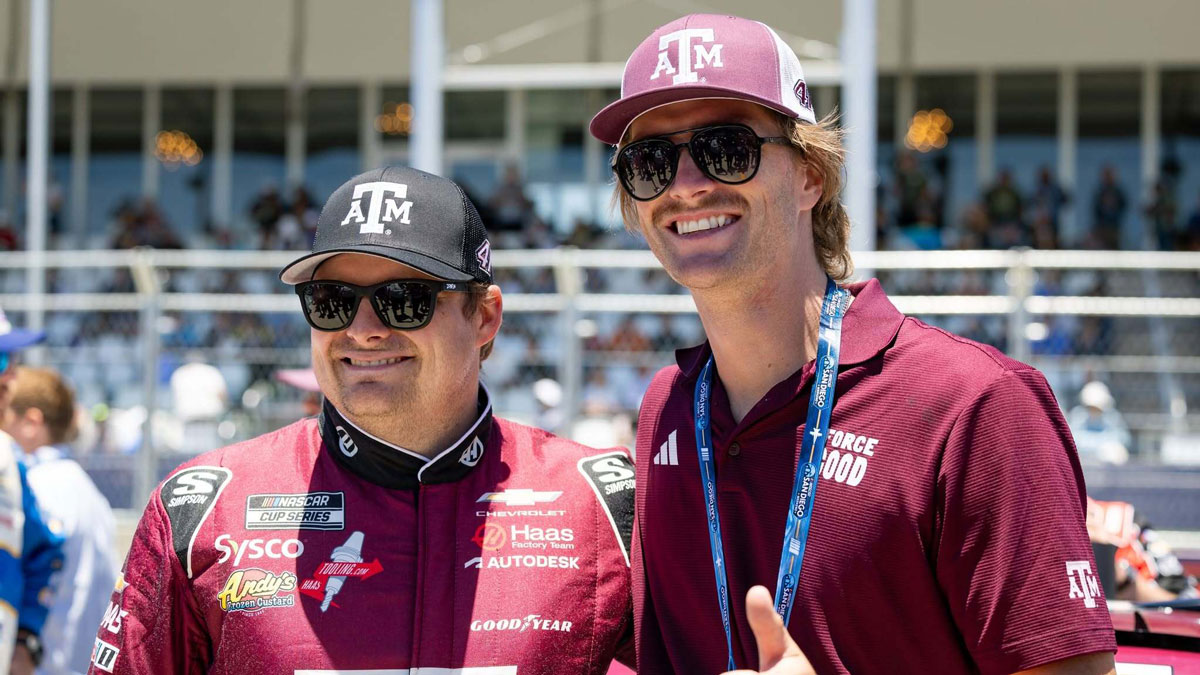 Hayden Schott and Cole Custer standing together before the race