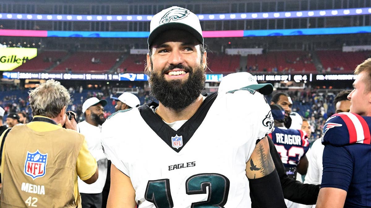 Will Grier walks off the field at Gillette Stadium.