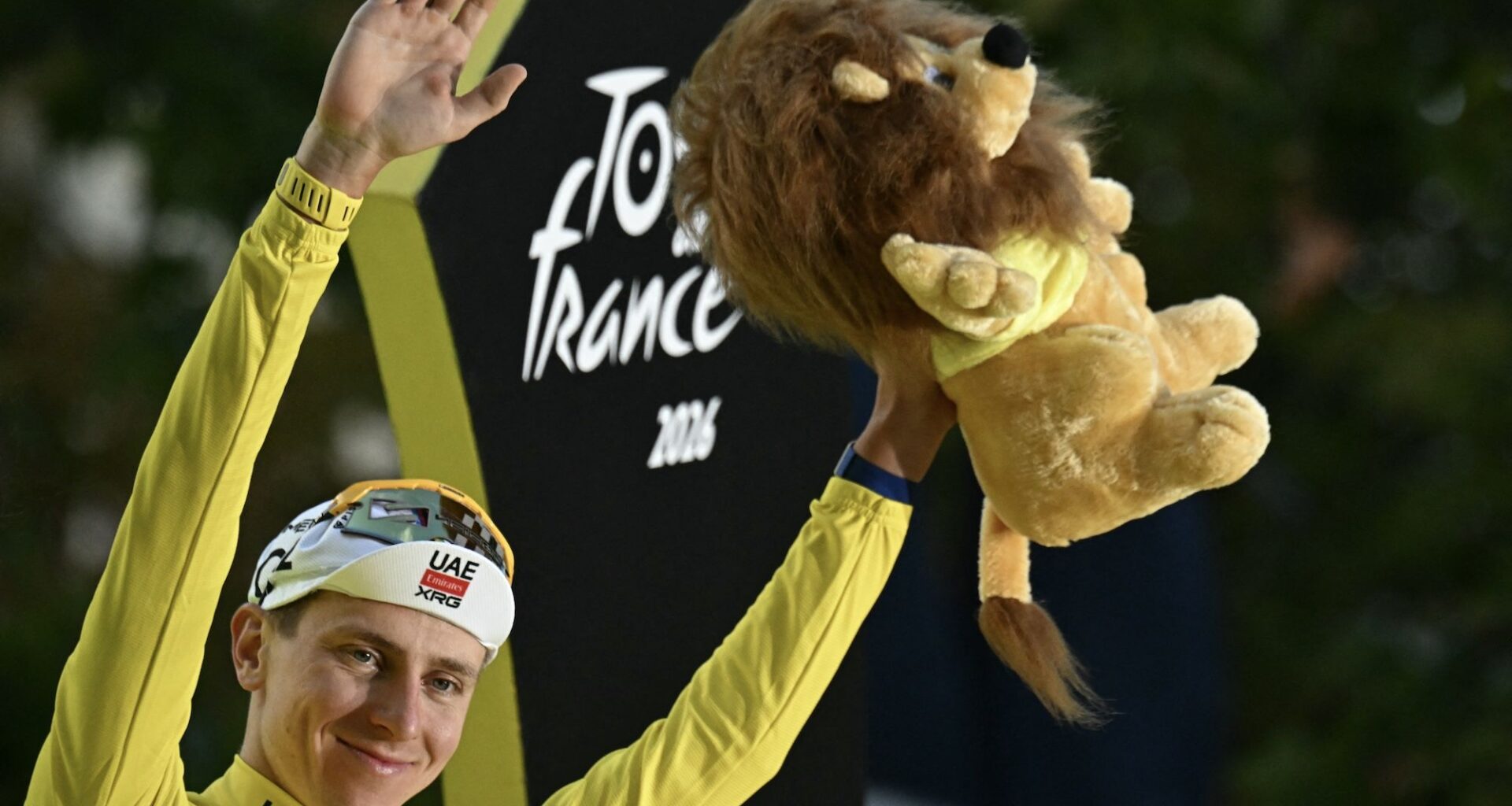 ‘I’m not thinking about any history, clubbing, or whatever' - Tour de France winner Tadej Pogačar has his name in lights but keeps his feet on the ground