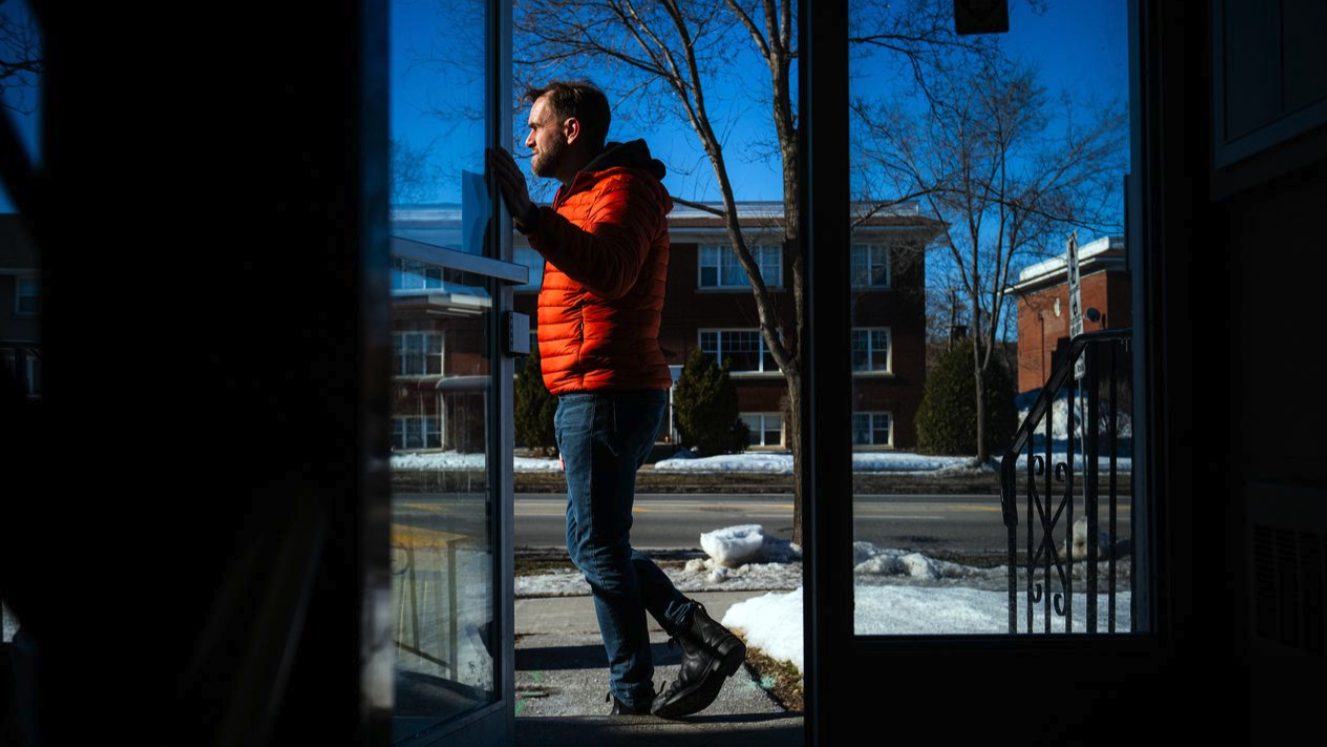 Mike Bulthuis, OCLT Executive Director, stands in the doorway of the Land Trust&rsquo;s first acquisition.