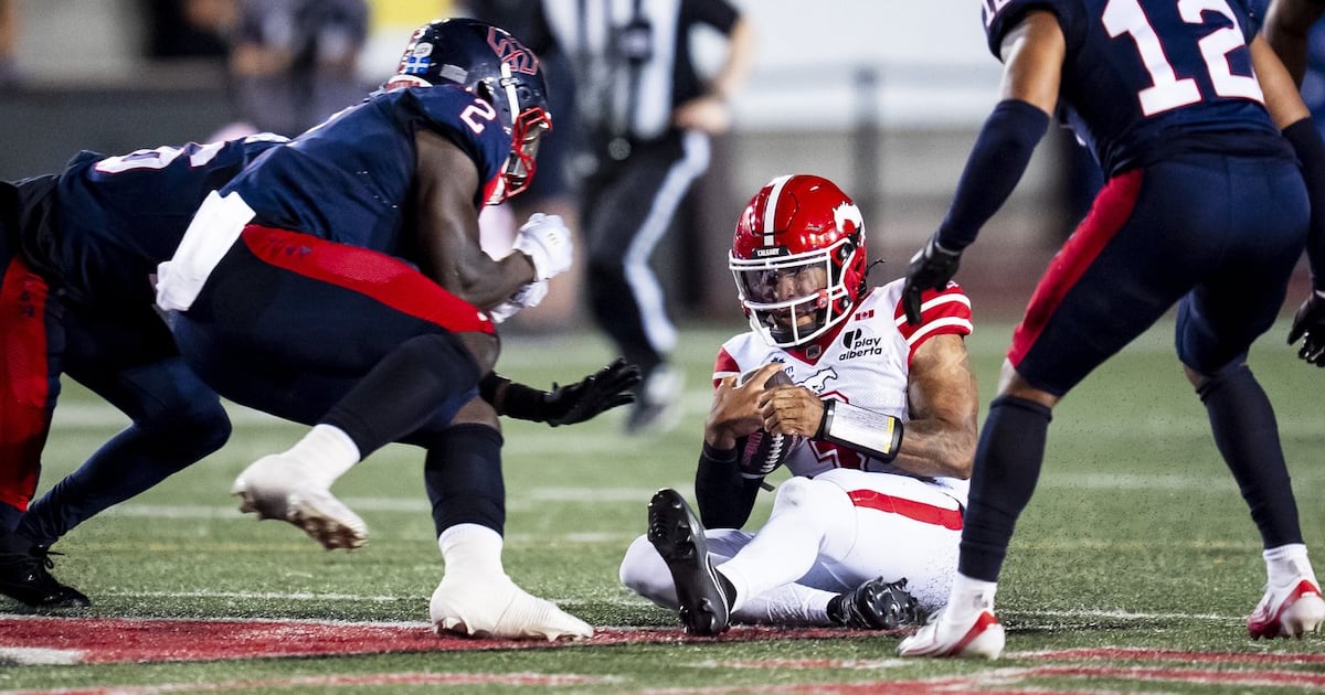 CFL fines Montreal Alouettes' Micah Awe for high hit on Calgary Stampeders QB Vernon Adams Jr.