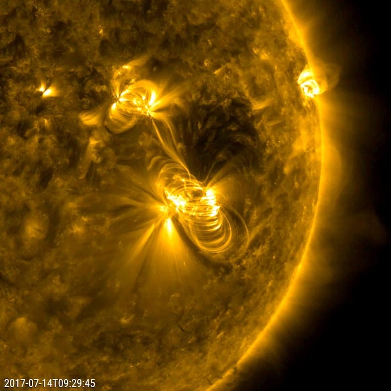 A solar flare and coronal mass ejection erupt from the Sun's surface, captured in extreme ultraviolet light by NASA's Solar Dynamics Observatory (Credit : NASA/GSFC/Solar Dynamics Observatory)