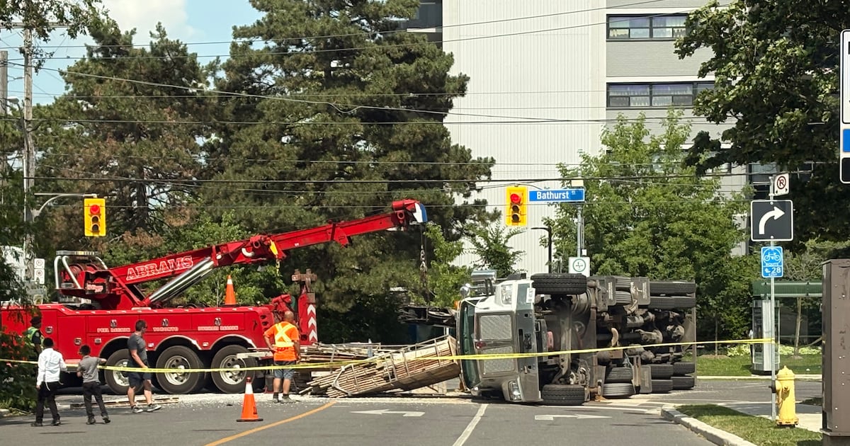 Truck flipped over after multi-vehicle crash in North York