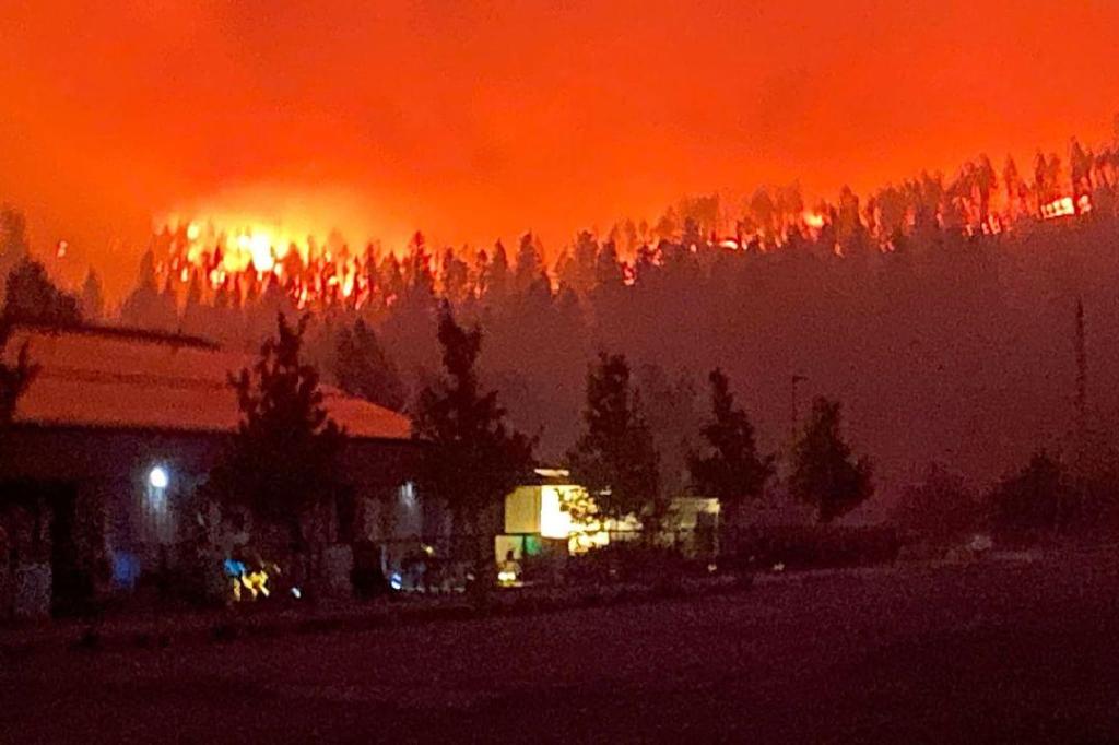Clinton ‘preserved from major loss’ as Pear Lake fire grows overnight