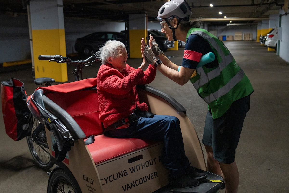 In Vancouver, cycling volunteers help seniors break out of isolation and feel the wind in their hair