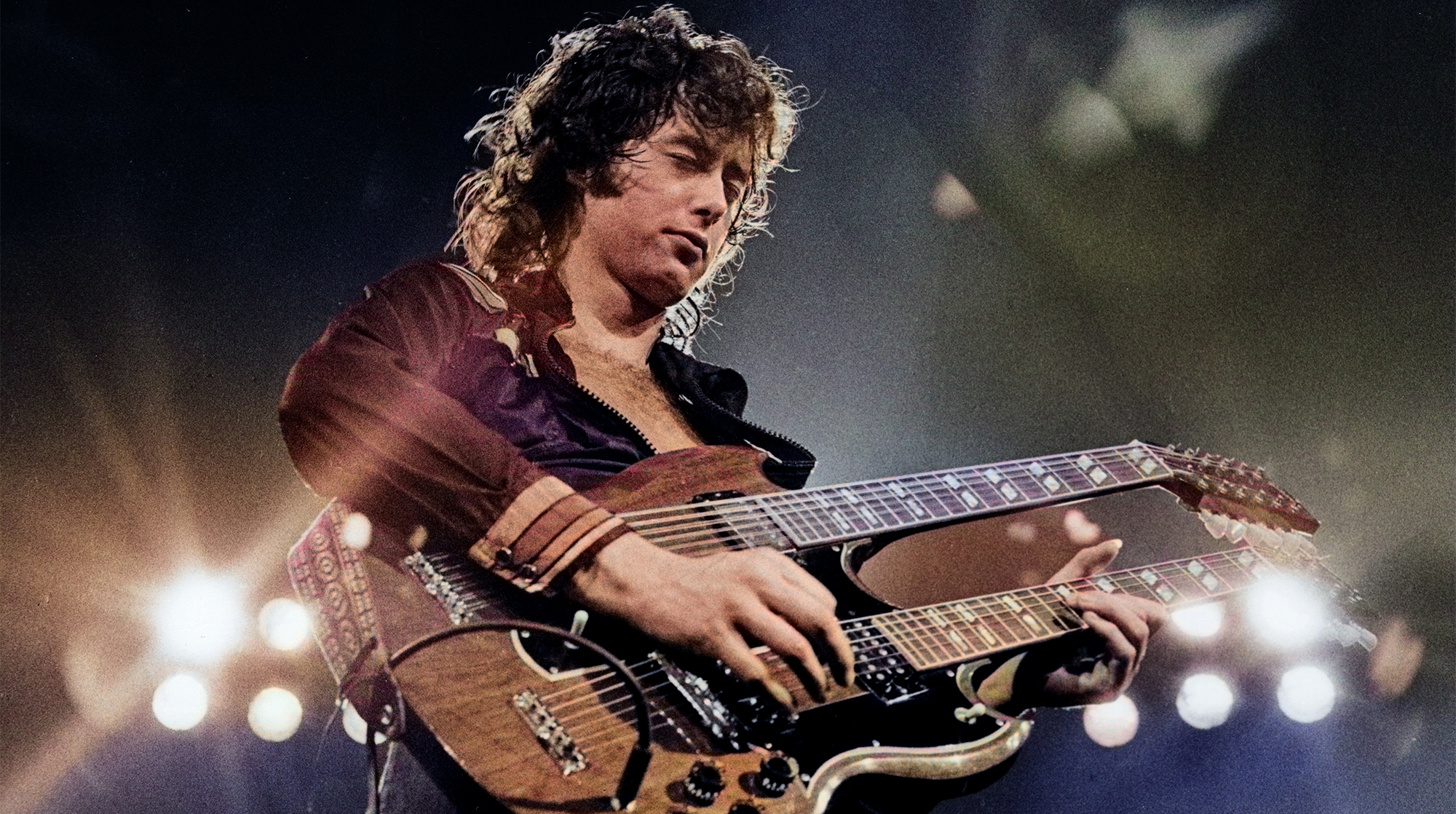 Guitarist Jimmy Page performing with his band 'Led Zeppelin' at the Seattle Coliseum, June 1972.