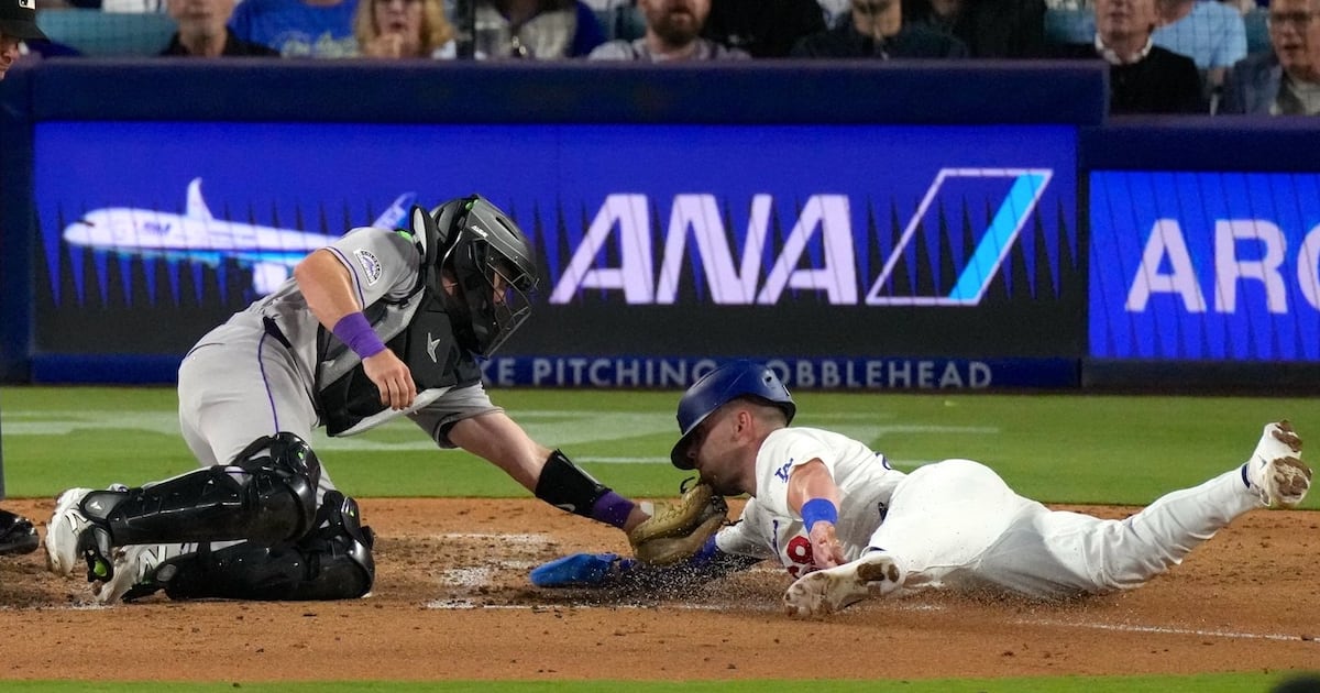 Colorado Rockies rally past Los Angeles Dodgers after two errors in the eighth