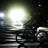TOPSHOT - A man rides his bike during a nation wide blackout in Havana on March 21, 2026. A power outage struck the entire island of Cuba on March 21, 2026, the energy ministry said, in the second nationwide blackout in less than a week as its grid struggles under a US oil blockade. (Photo by Yamil LAGE / AFP via Getty Images)