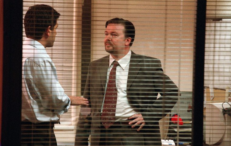 The Office S2 - Picture Shows: PATRICK BALADI as Neil & RICKY GERVAIS as David The Office Series 2 TV still UKTV