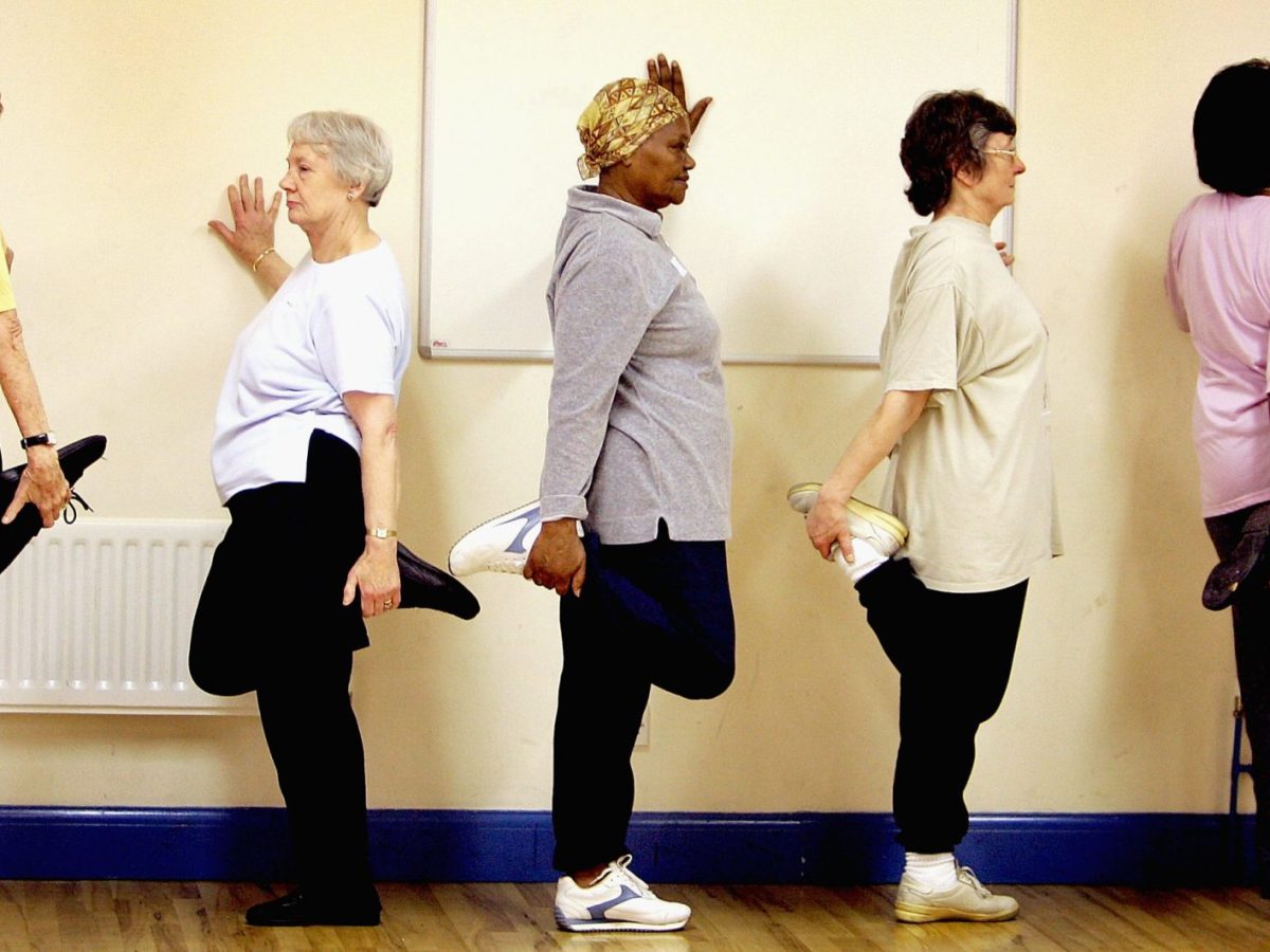 LONDON, ENGLAND - NOVEMBER 2: Pensioners exercise during a fitness class for older people November 2, 2004 in London. The class is part of the government's National Service Framework for Older People scheme which promotes independence and well-being for older people. (Photo by Ian Waldie/Getty Images) *** Local Caption ***