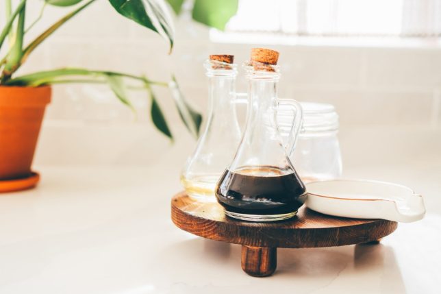 Bottles of olive oil and vinegar in the kitchen.