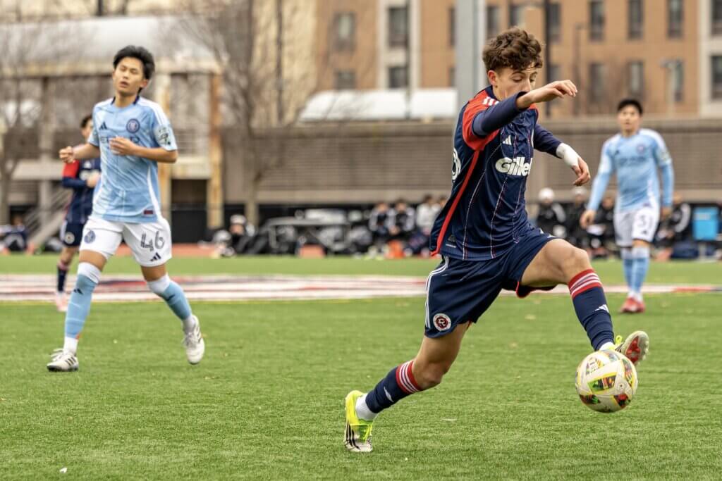 Brandon Velez tallied a goal and an assist in this New England Revolution junior match against New York City FC in Queens this past March. Photo by Janel Apuna