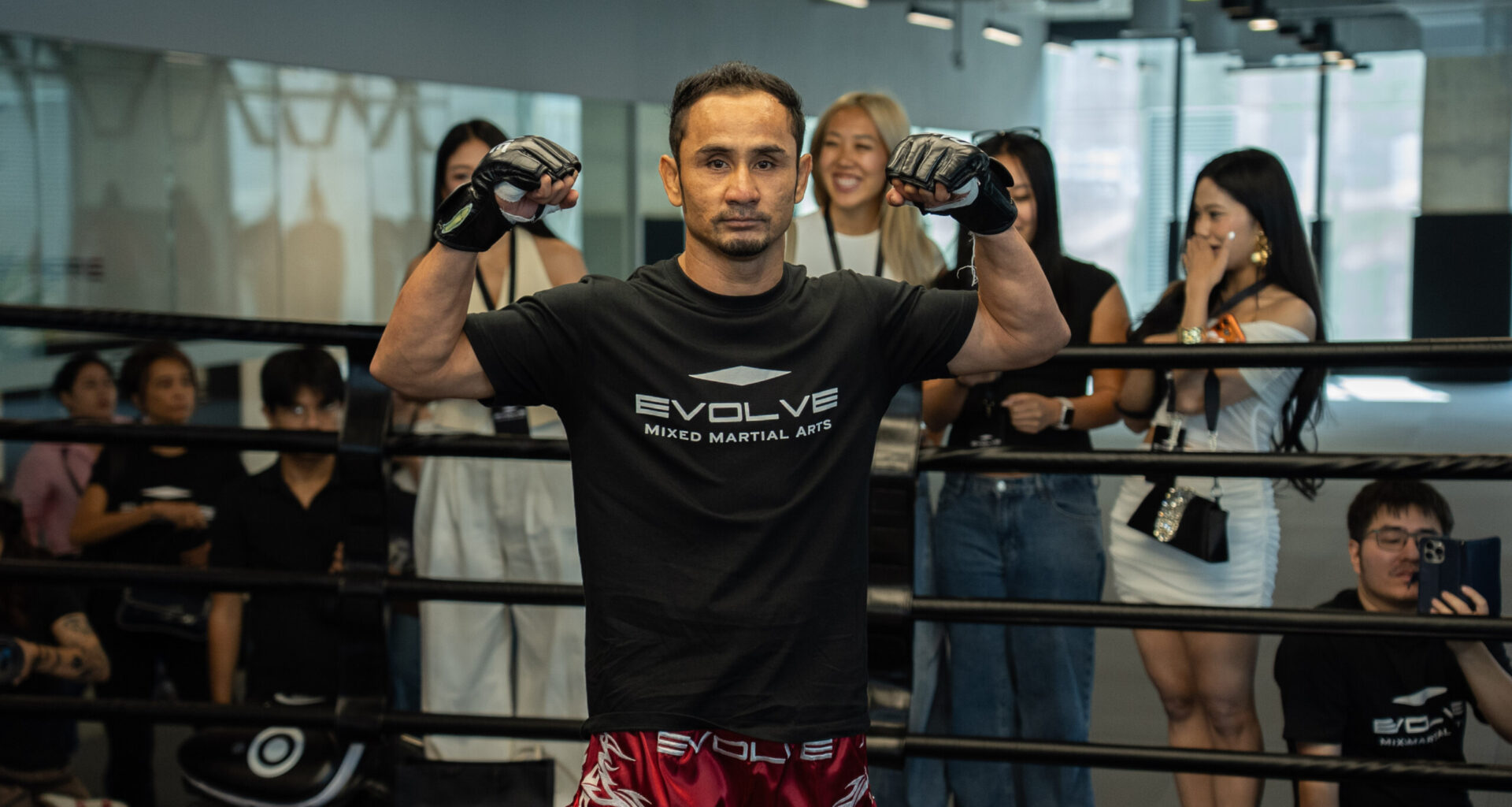 Sam-A Gaiyanghadao strikes a pose for photographers at The Inner Circle 23 open workout