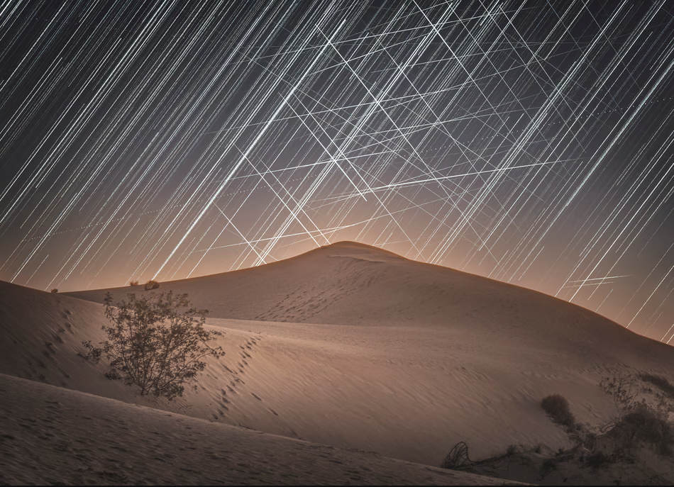 Honourable mention, nightscapes category: Satellite Web Over Dunes, Lucy Yunxi Hu, David Malin Awards 2025