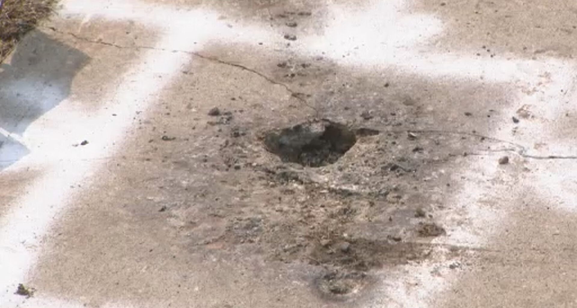 Lightning strikes north Edmonton sidewalk