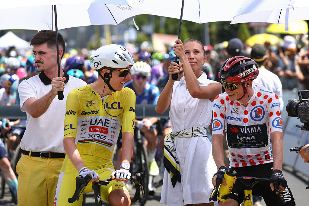 Tadej Pogačar and Jonas Vingegaard laugh together at the start of a stage of the 2026 Tour de France