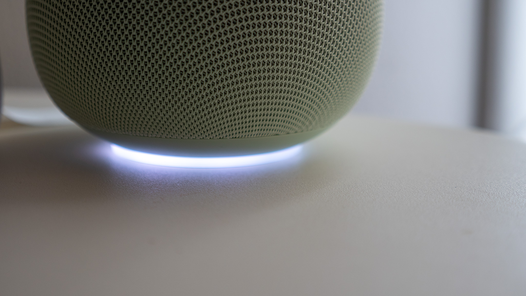 The glowing LED array on the underside of the Google Home Speaker