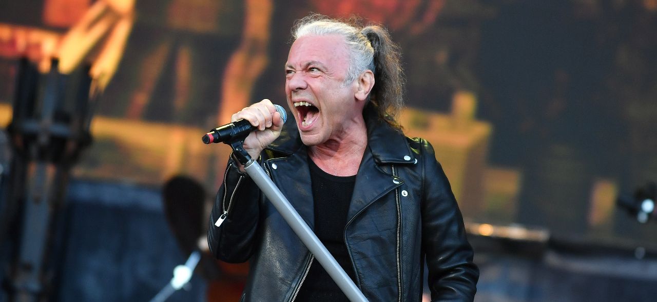 Bruce Dickinson singing on stage