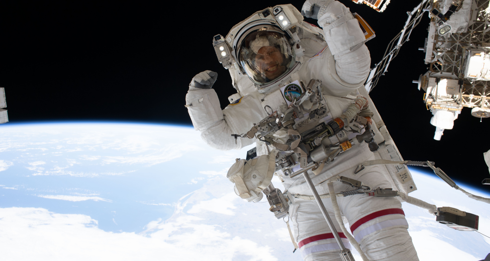 Astronaut flexes his muscles mid-spacewalk photo of the day for July 7, 2026