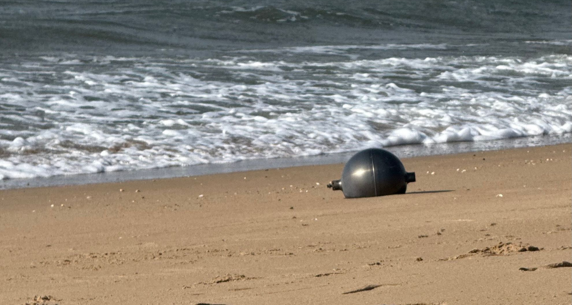 Mystery 'space balls' wash ashore on Queensland beach - The Weather Network