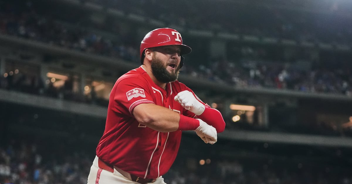 Wyatt Langford, Jake Burger homer in four-run eighth as Texas Rangers beat Houston Astros