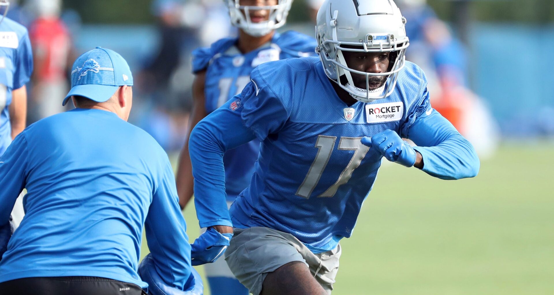 Detroit Lions wide receiver Denzel Mims (17) runs a route during training camp Tuesday, July 25, 2023.