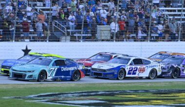 Joey Logano and Kyle Larson race side-by-side during a NASCAR Cup Series event at Texas Motor Speedway.