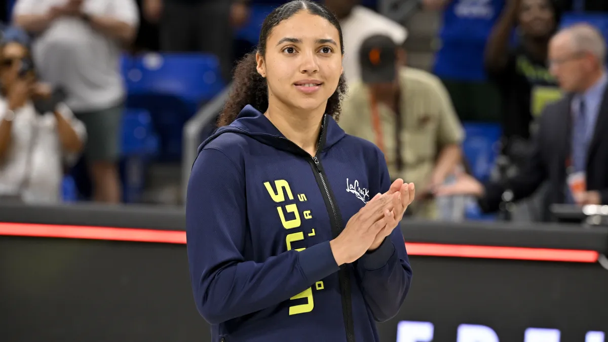 Azzi Fudd shows off glamorous look before making rare WNBA history image