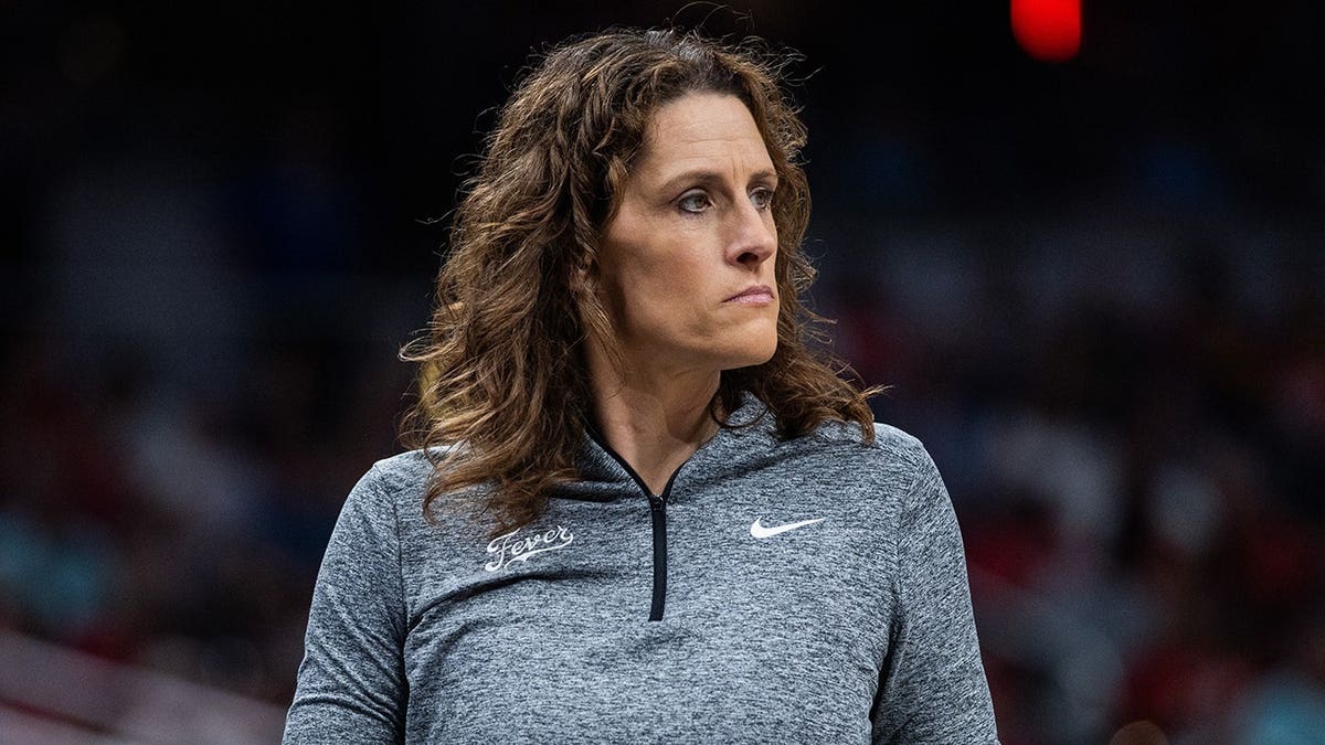 Indiana Fever head coach Stephanie White looks on during a game at Gainbridge Fieldhouse.