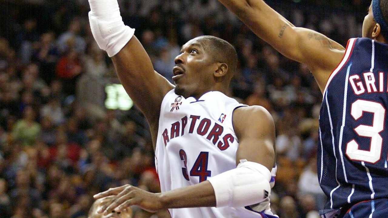 Toronto Raptors centre Hakeem Olajuwon (34) drives to the hoop during first-half NBA action in Toronto on Wednesday, Jan.16, 2002. (Frank Gunn/CP)
