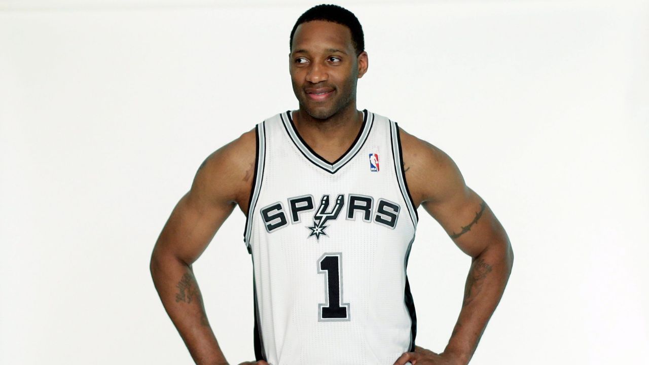 San Antonio Spurs' Tracy McGrady waits to be photographed in a Spurs basketball uniform on Wednesday, April 17, 2013, in San Antonio. (Eric Gay/AP)