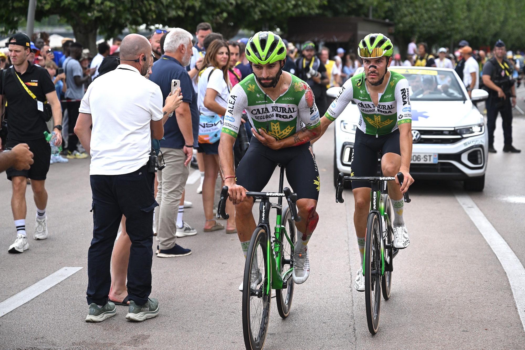 CHALON-SUR-SAONE, FRANCE - JULY 16: (L-R) Fernando Gaviria of Colombia injured after with his teammate Stefano Oldani of Italy and Team Caja Rural - Seguros RGA during the 113th Tour de France 2026, Stage 12 a 179.1km stage from Circuit Nevers Magny-Cours to Chalon-sur-Saone / #UCIWT / on July 16, 2026 in Chalon-sur-Saone, France. (Photo by Dario Belingheri/Getty Images)