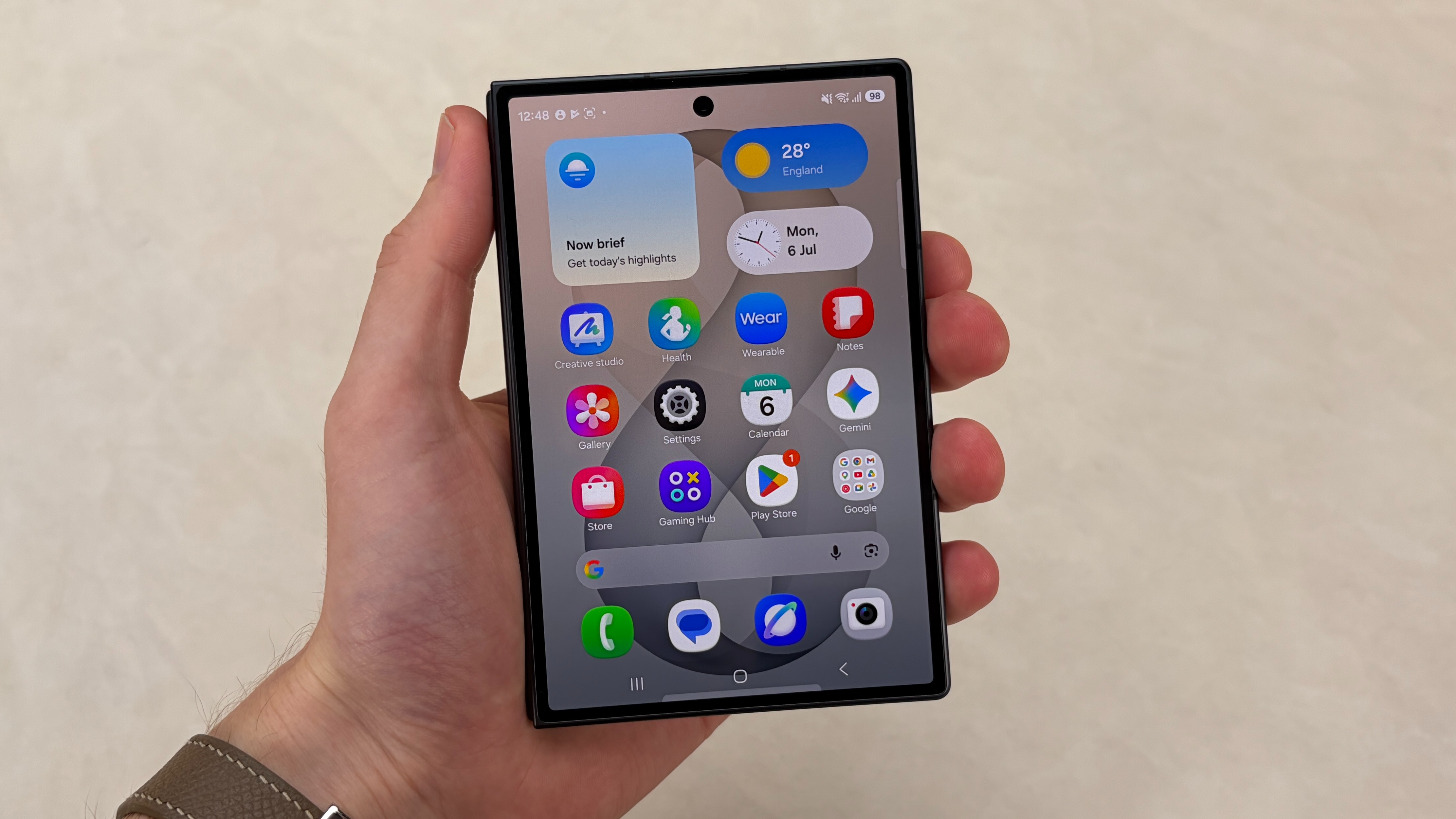 The Samsung Galaxy Z Fold 8 in the hand