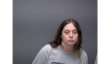 Woman with severe mental problems sitting in jail cell waiting on treatment